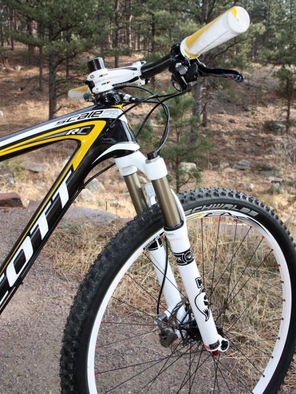 The tapered head tube, stiff carbon structure, and 15mm thru-axle dropouts make for a precise-handling front end.
