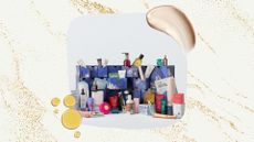 Image of the John Lewis Beauty Advent Calendar 2026 on a beige background with gold sparkles, cream and oil swatches