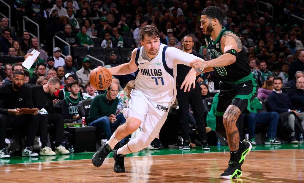 Luka Doncic #77 of the Dallas Mavericks dribbles the ball during the game against the Boston Celtics on March 1, 2024