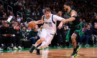 Luka Doncic #77 of the Dallas Mavericks dribbles the ball during the game against the Boston Celtics on March 1, 2024