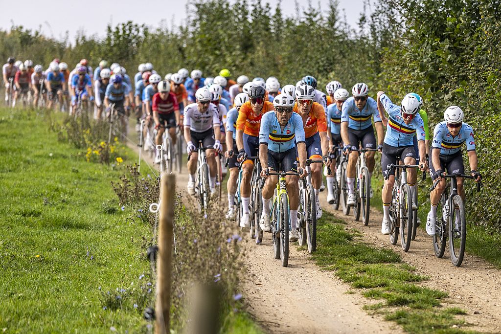 The pack rides during the men&#039;s elite race cycling event as part of the UCI Gravel World Championships in Maastricht, on October 12, 2025. (Photo by Marcel van Hoorn / ANP / AFP) / Netherlands OUT