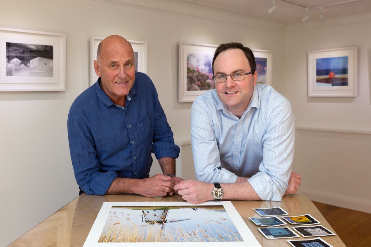 Charlie Waite with Luke Whitaker, the director of Bosham Gallery 