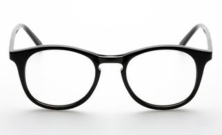 Black oval framed glasses with clear lenses.