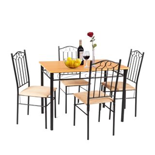 A dining table set with four chairs