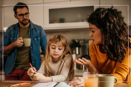 Parents sitting with their child