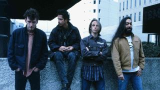 Soundgarden sitting on an outside wall in 1996