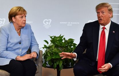Trump meets with Angela Merkel at G-7 summit