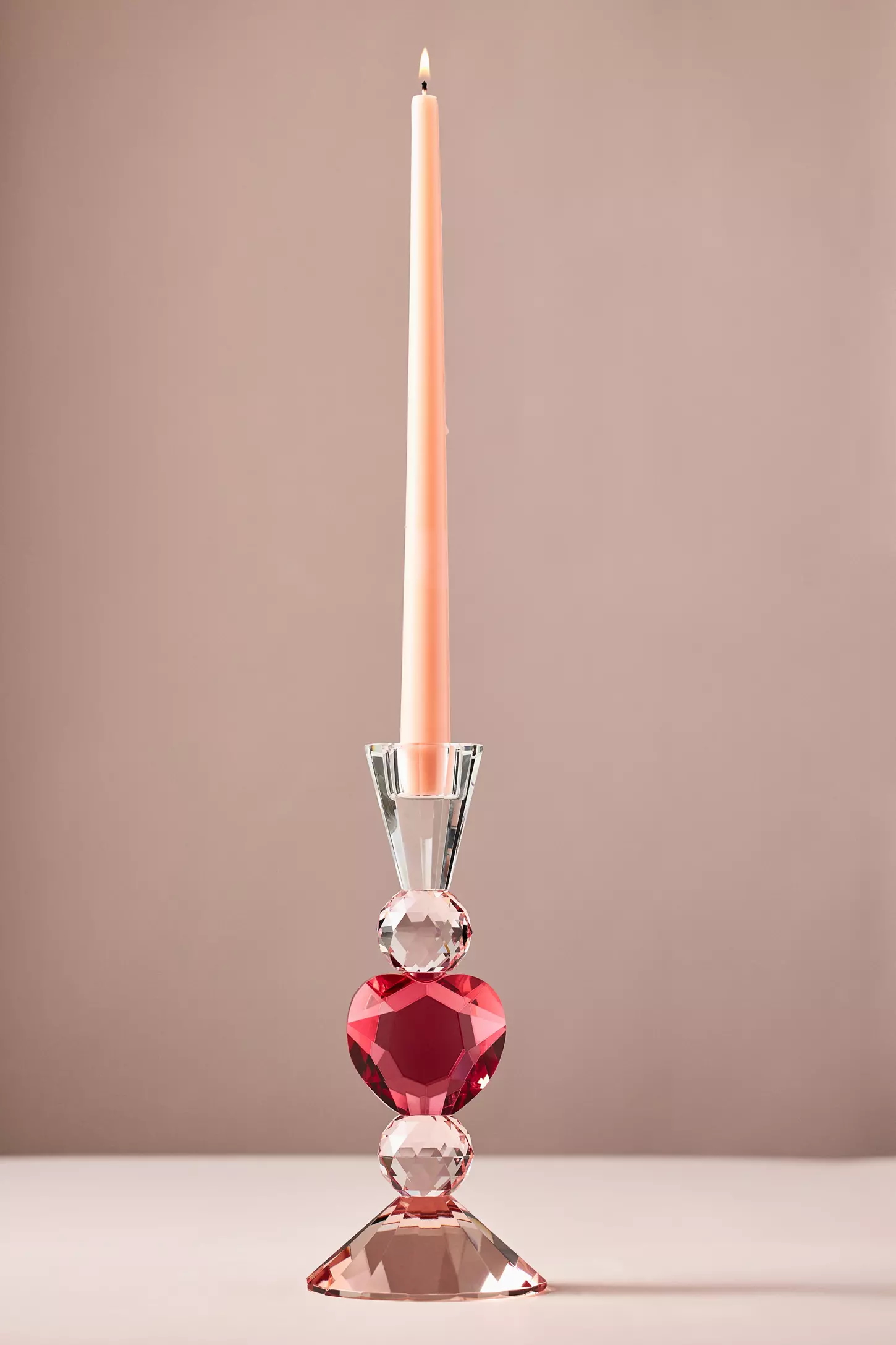 A glass heart candle holder