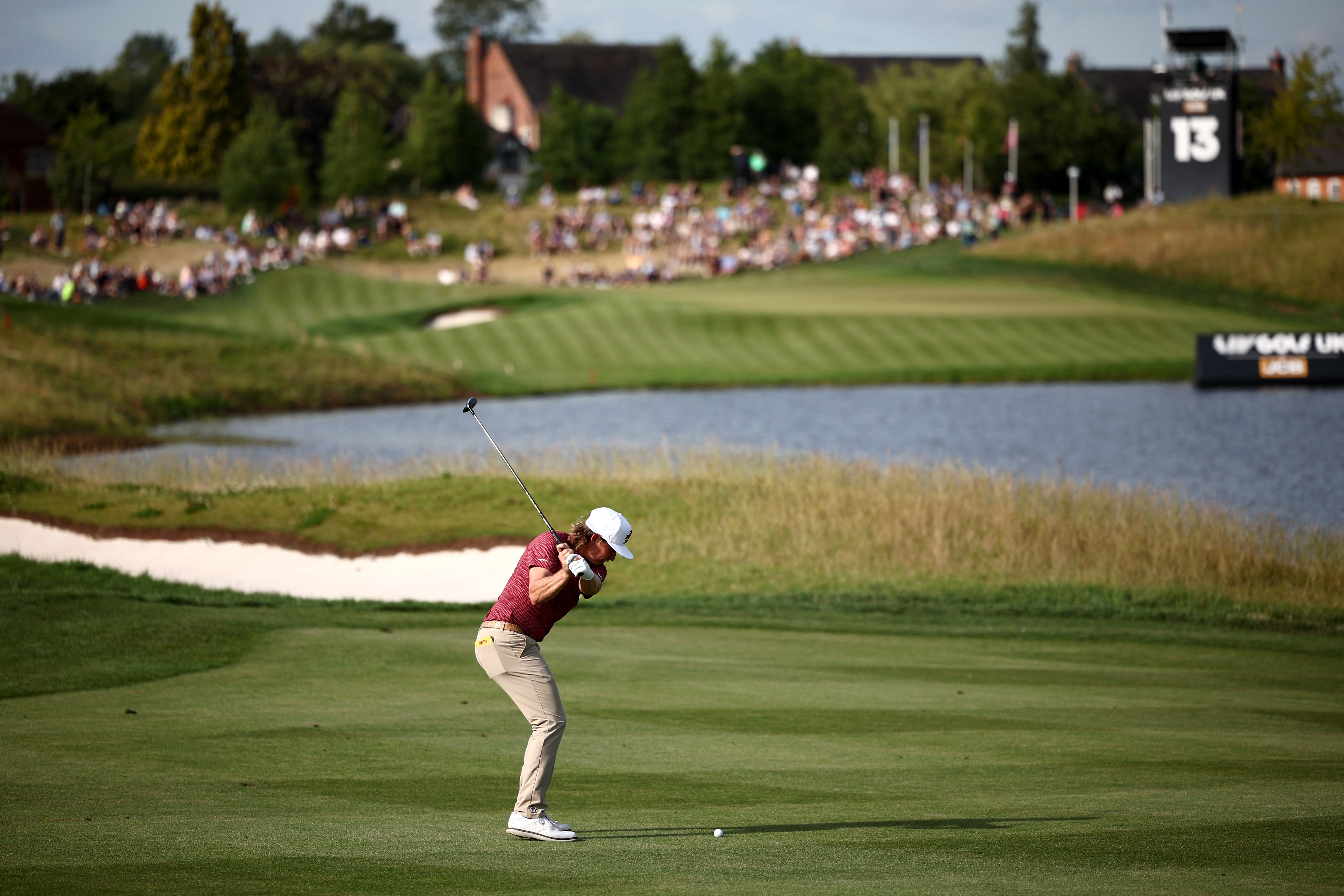 LIV golfer Cameron Smith plays an approach shot on the 13th hole at JCB Golf & Country Club