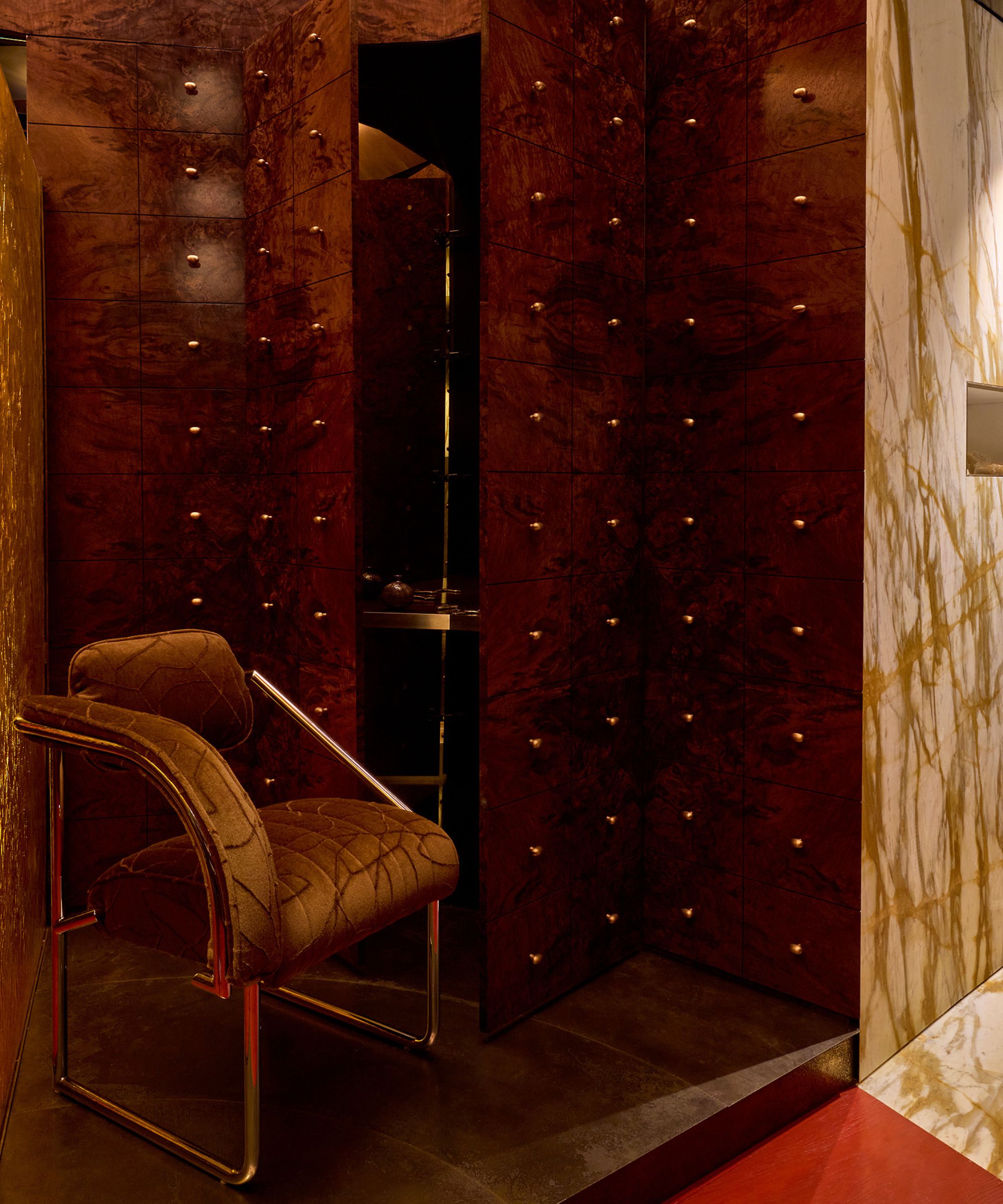 a burl wood library with a wall of small drawers for WowHouse 2026