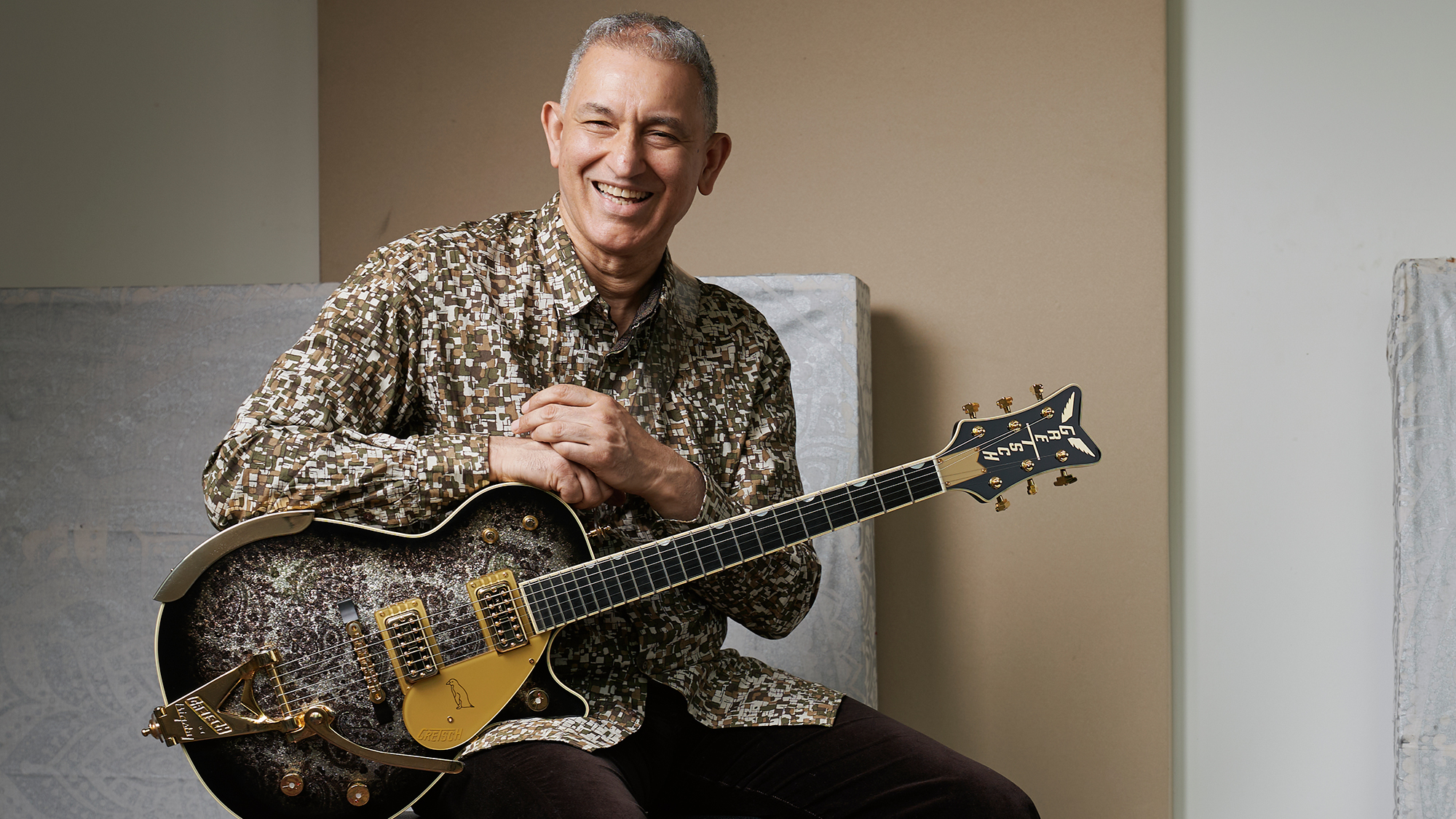 Aziz Ibrahim with his guitar