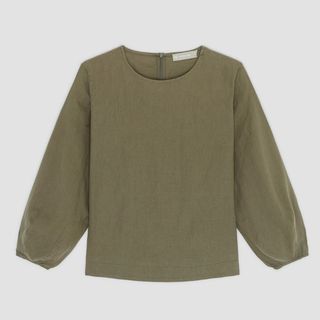flat lay of everlane linen long sleeve top in green