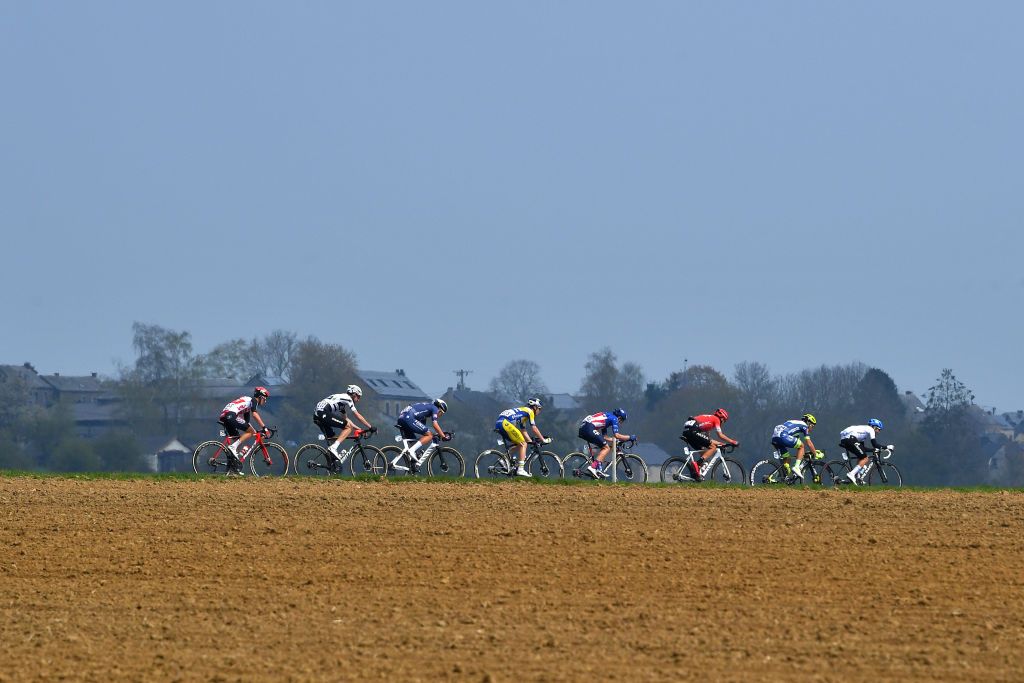 MUR DE HUY BELGIUM APRIL 21 Alex Howes of United States and Team EF Education Nippo Julian Mertens of Belgium and Team Sport Vlaanderen Baloise Maurits Lammertink of Netherlands and Team Intermarch Wanty Gobert Matriaux Diego Rosa of Italy and Team Arka Samsic Sylvain Moniquet of Belgium and Team Lotto Soudal Louis Vervaeke of Belgium and Team AlpecinFenix Sander Armee of Belgium and Team Qhubeka Assos Simone Velasco of Italy and Team Gazprom Rusvelo during the 85th La Fleche Wallonne 2021 Men Elite a 1936km race from Charleroi to Mur de Huy 204m Breakaway Landscape FlecheWallonne on April 21 2021 in Mur de Huy Belgium Photo by Luc ClaessenGetty Images