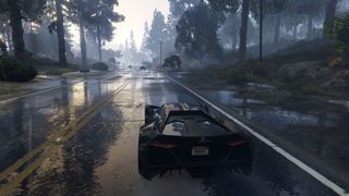 GTA 5 mods - a black car driving through a wooded area