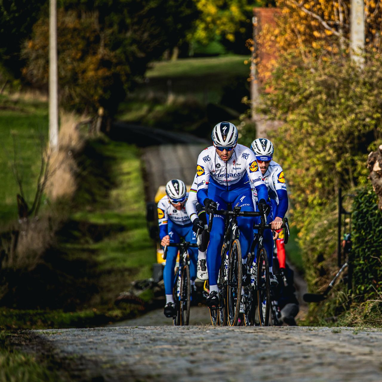 The riders test themselves on the numerous cobbled climbs