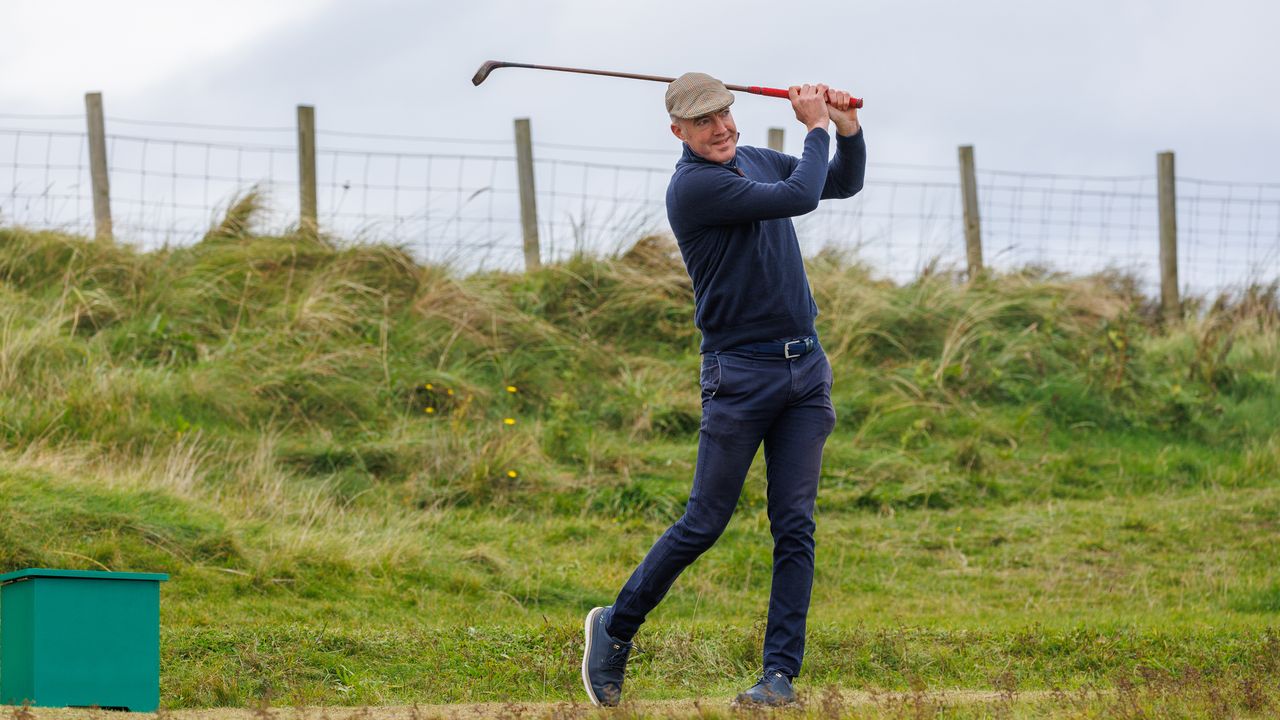 Fergus Bisset teeing off at Prestwick