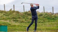 Fergus Bisset teeing off at Prestwick