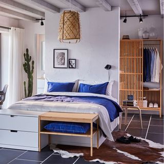 bedroom with bed with cushions nordkisa wardrobe handy sliding door over stuffed rails or untidy shelves