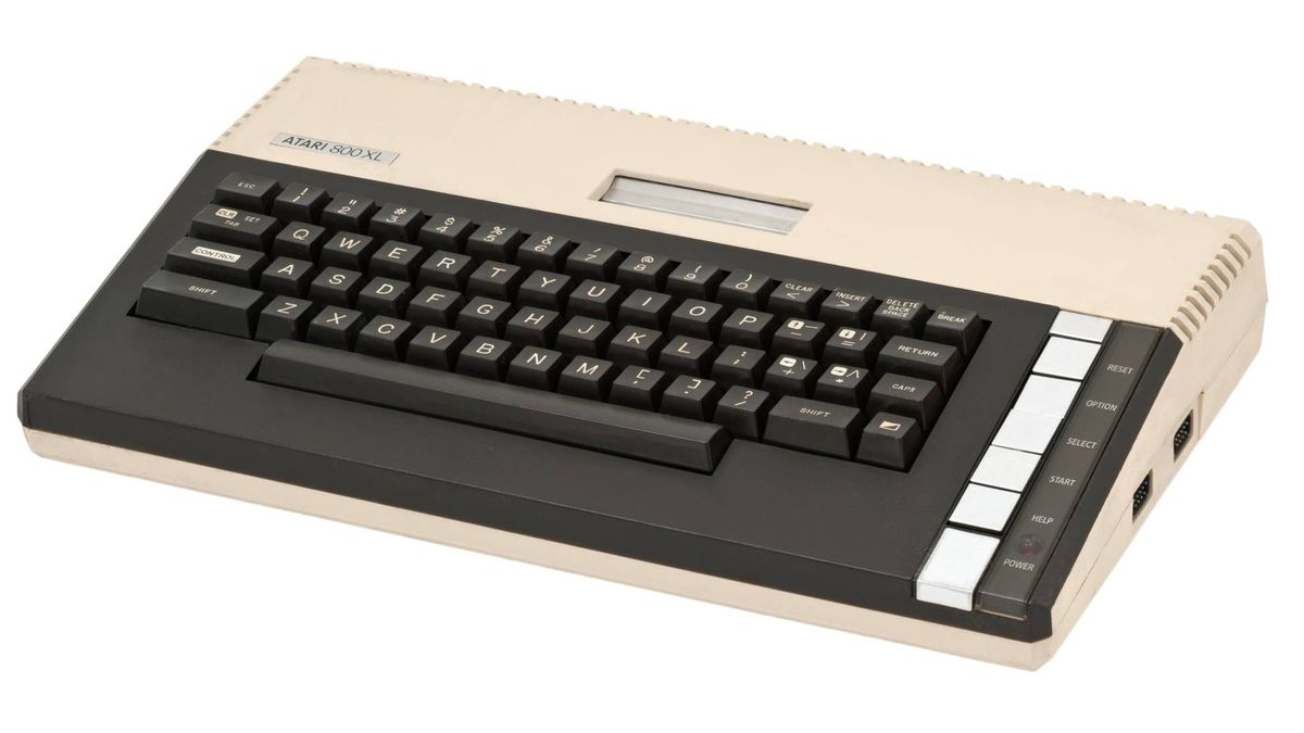 Atari 800XL microcomputer with white backdrop.