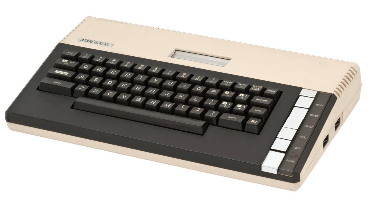Atari 800XL microcomputer with white backdrop.