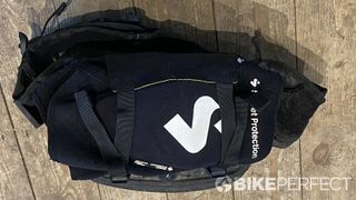 Ergon BA Hip Pack with knee pads strapped to the front