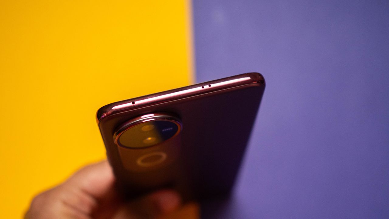 Vivo V50 against colorful background