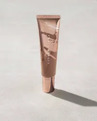 Fenty Beauty, Body Sauce Body Luminizing Tint &nbsp;$48 | £40
