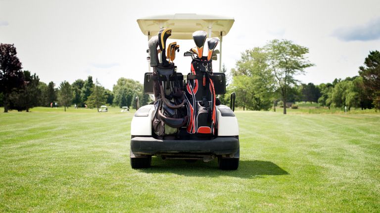 A golf cart parked on a course