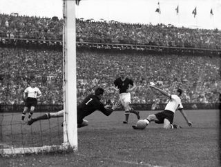 Max Morlock scores for West Germany in the 1954 World Cup final against Hungary.