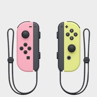 Nitnendo Switch Pastel color Joy-Con controllers on a grey background