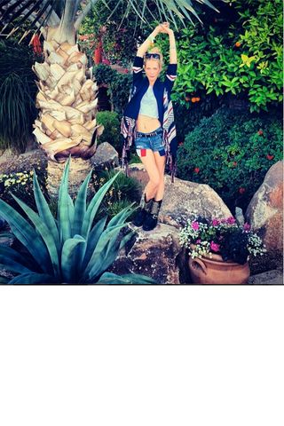 Poppy Delevingne Poses Under The Palms At Coachella 2014
