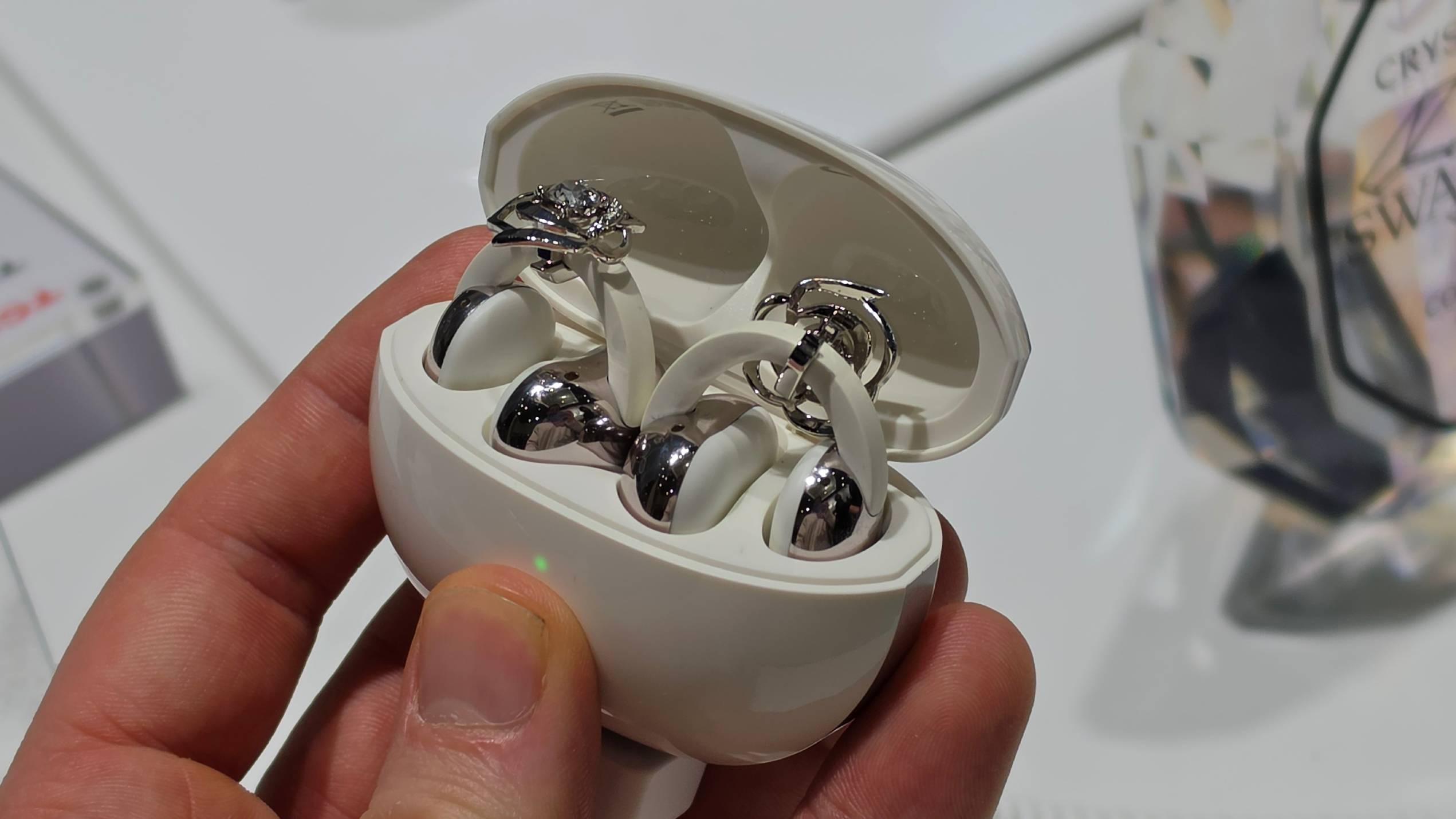 The TCL CrystalClip case in a man's hand.