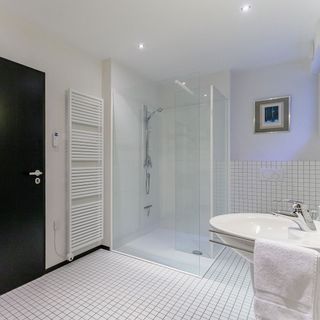 lincolnshire huf house bathroom with glass shower room and white bathroom sink