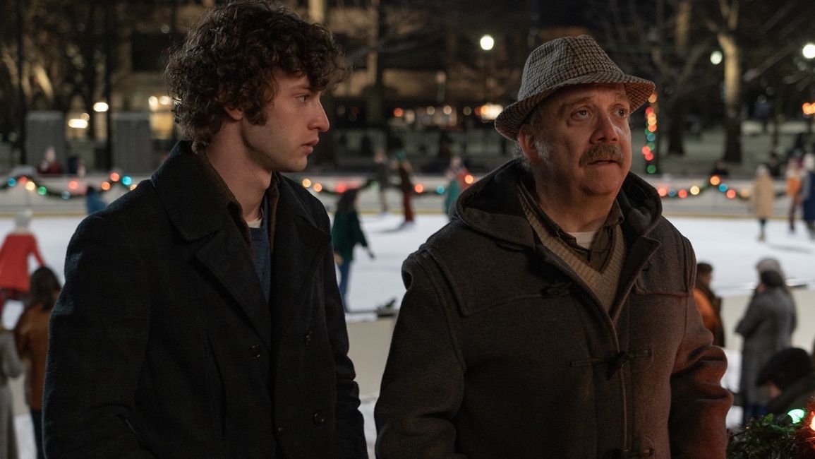 Paul Giamatti as Paul Hunham and Dominic Sessa as Angus Tully in The Holdovers