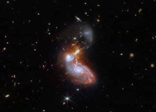 Webb captured this merging galaxy pair with a pair of its cutting-edge instruments: NIRCam – the Near-Infrared Camera – and MIRI, the Mid-Infrared Instrument