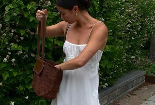 Woman in casual white dress.