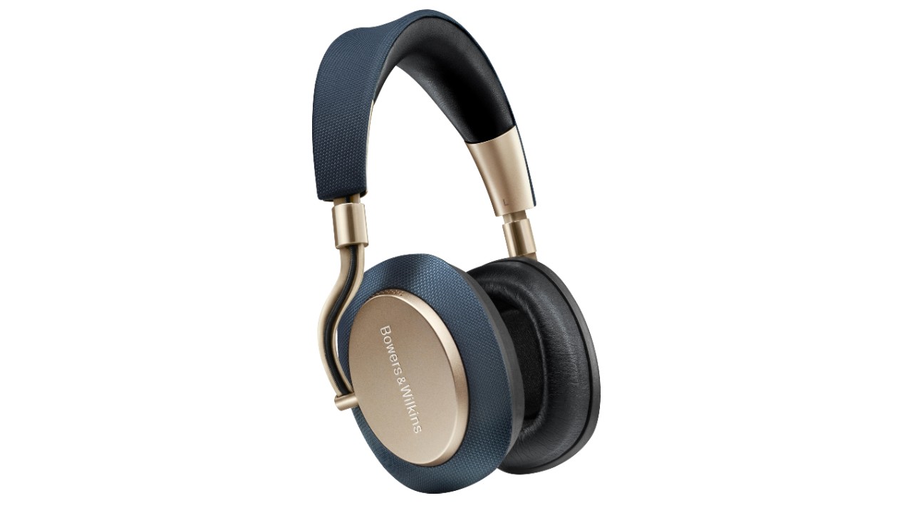 The Bowers and Wilkins PX7 Wireless noise canceling headphones in navy and gold on a white background.