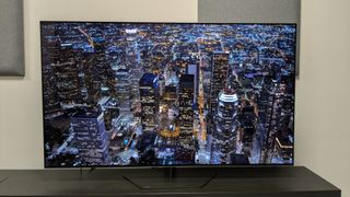 Philips OLED809 with city at night on screen