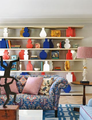 How to decorate above a sofa with shelving