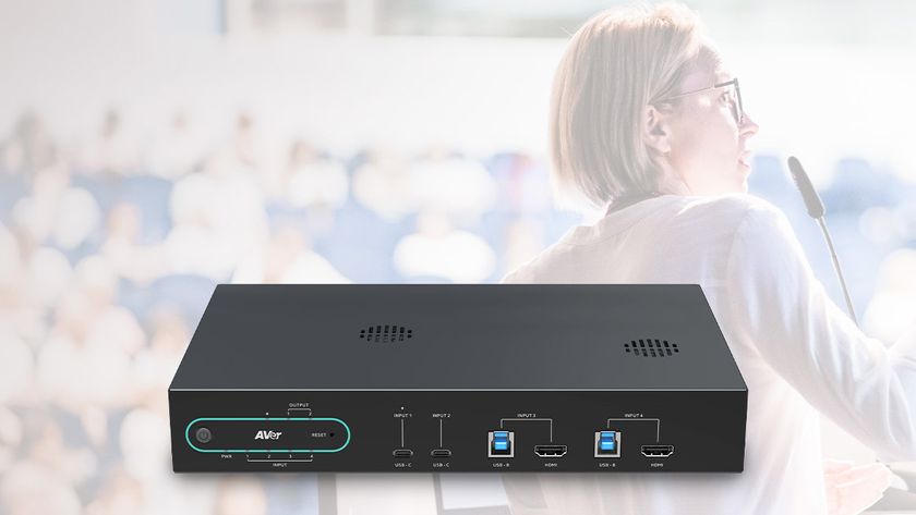 The new AVer HUB30, an AI-Powered BYOM Switch for Enterprise Collaboration superimposed over a woman speaker. 