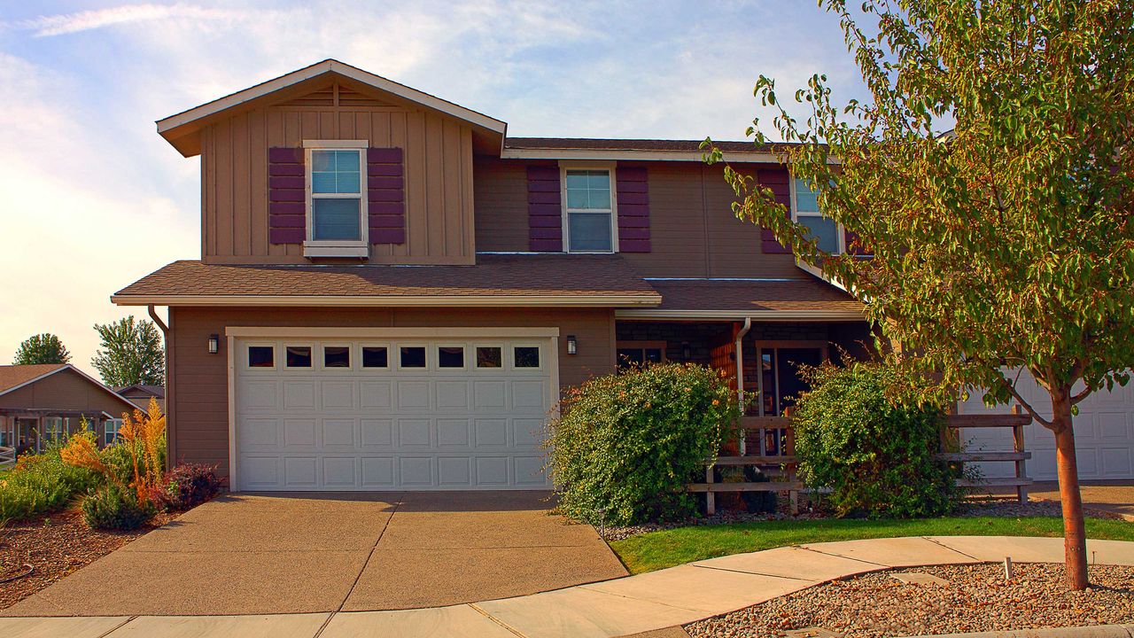 hosue exterior with white garage door