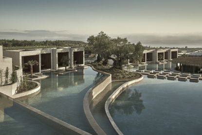 Luxury hotel suites with still swimming pools