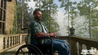 Frank Woods sits in a wheelchair