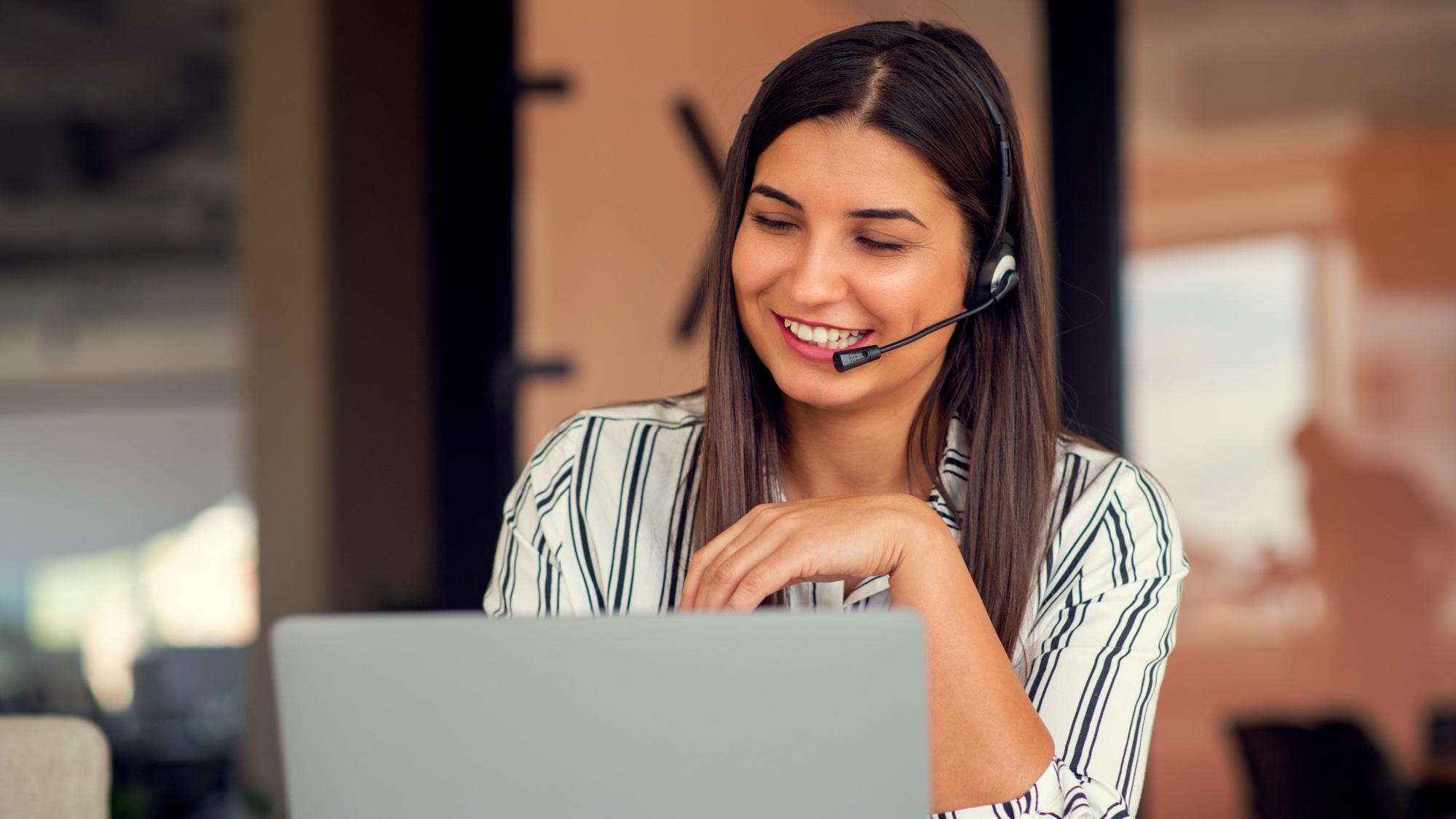woman taking customer support call