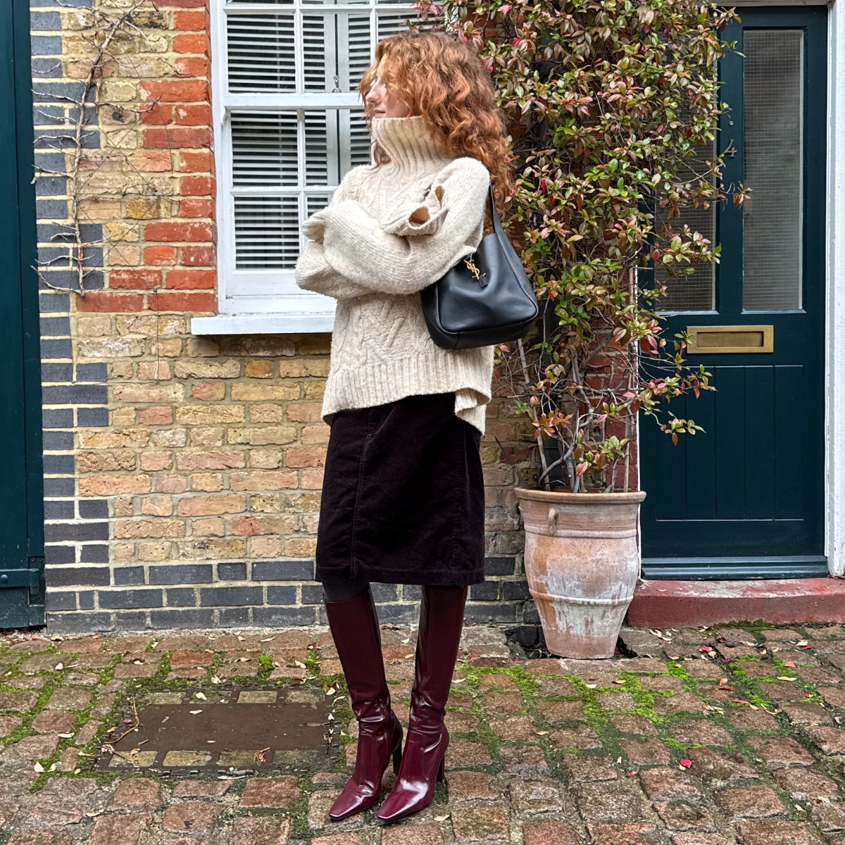 Influencer, street style documenter and TikToker Verona Farell in a winter outfit with YSL boots