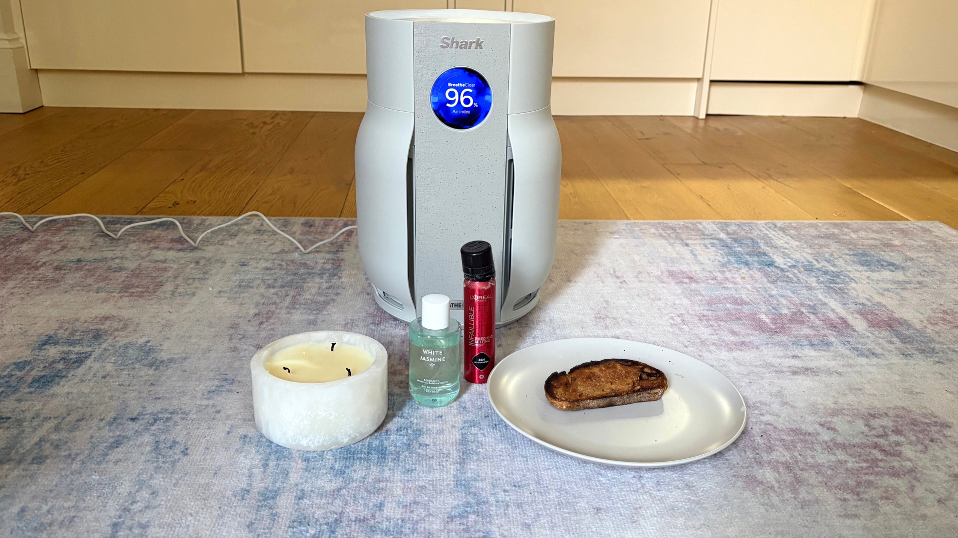 Testing the Shark BreatheClear with NeverChange6 Air Purifier by showing three tests: sprays, candles and toast in front of the air purifier