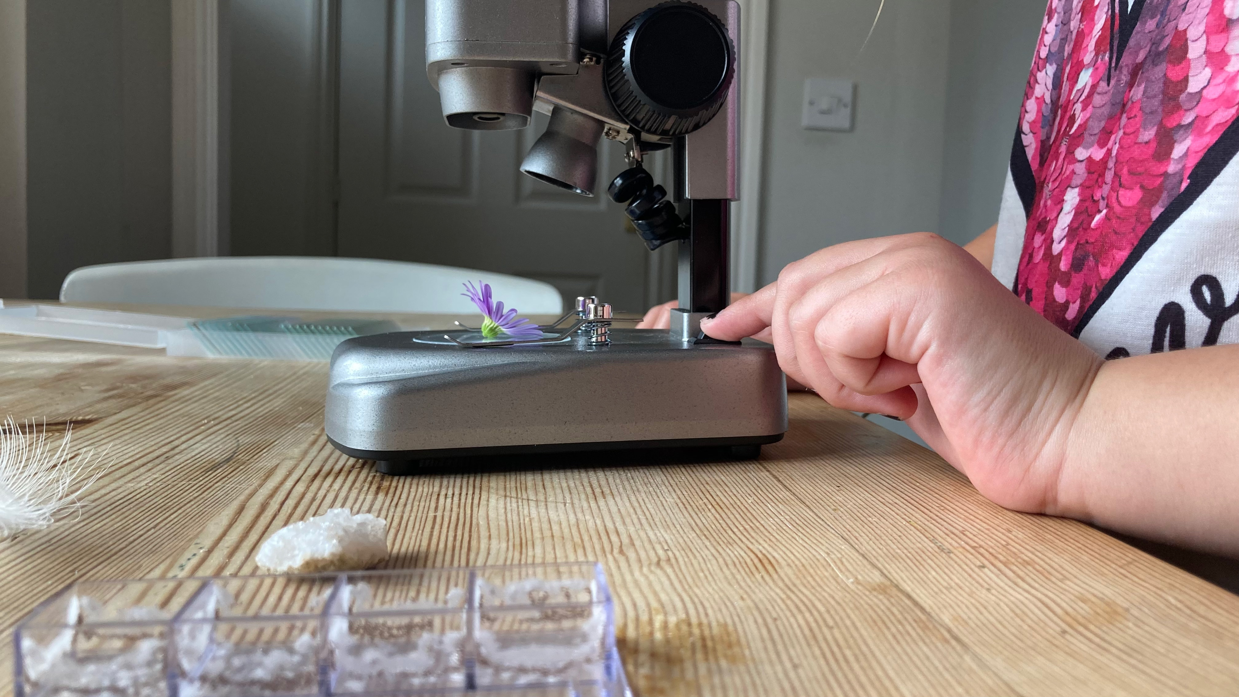 A child using the National Geographic Ultimate Dual Stereo Microscope