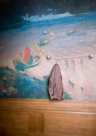 Jacket hanging on painted wall