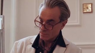 Daniel Day-Lewis in a white suit in Phantom Thread