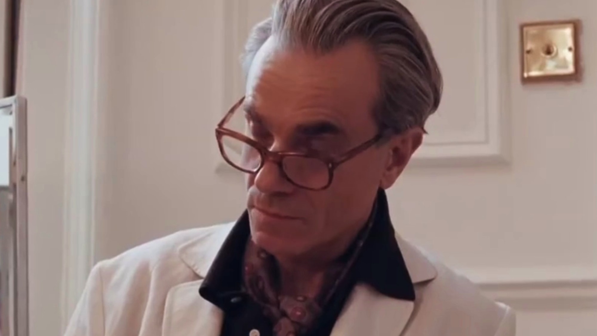 Daniel Day-Lewis in a white suit in Phantom Thread